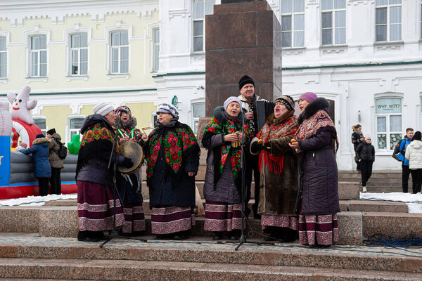 OMSK, RUSSIA - MARCH 1, 2020: Folk festivals. Maslenitsa in Russia. Maslenitsa Week in Siberia. Carnival. People Celebrating Shrovetide