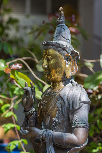 Buddha bronze statue in Gangaramaya Temple. 