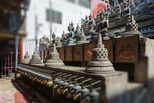 Buddhist statue in Gangaramaya Temle. — Stock Photo, Image