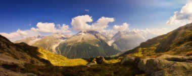 massive Grandes Jorasses and Mont Blanc in summer clipart