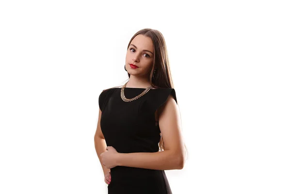 Portrait of a beautiful girl in a little black dress isolated on — Stock Photo, Image