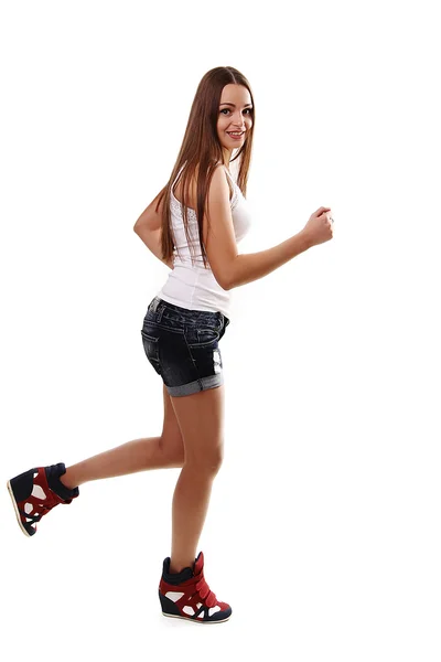 Full-length foto van lopende vrouw op witte achtergrond — Stockfoto
