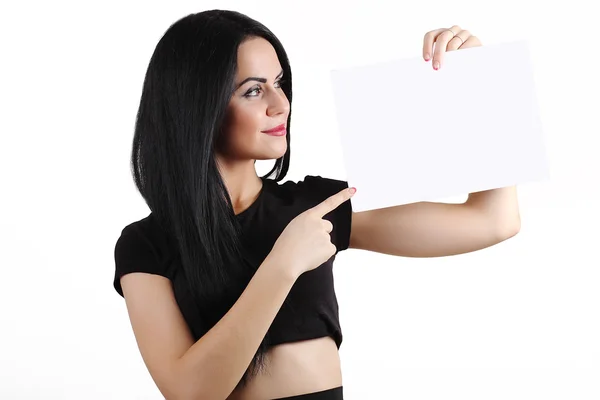 Portrait of a beautiful business woman holding a blank billboard — Stock Photo, Image