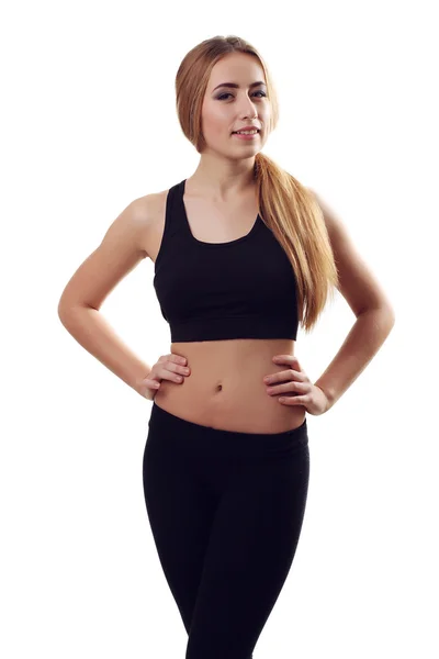 Porträtt av sexiga unga kvinnan tittar på kameran. Fitness kvinnliga w — Stockfoto