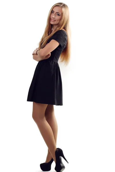 Portrait of a beautiful girl in a little black dress isolated on — Stock Photo, Image