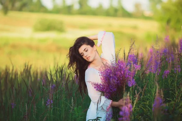 Girl in a field, beautiful white long dress — Stock Photo, Image