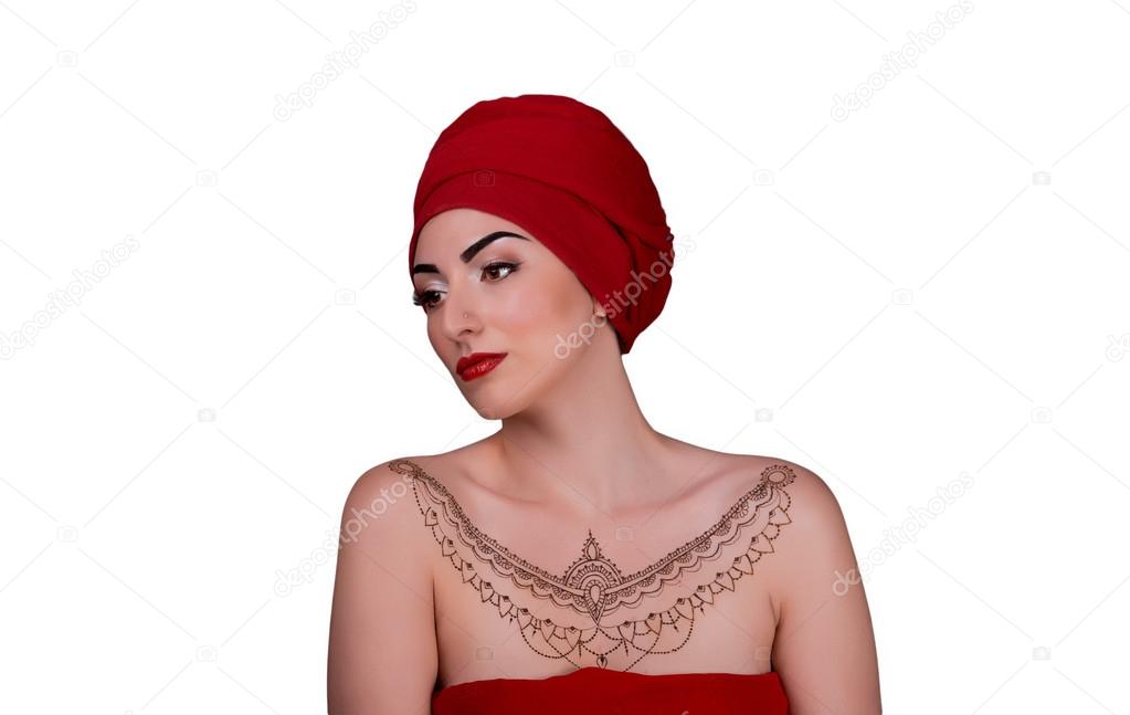 beautiful Arab girl in red scarf, henna tattoo. isolated white b