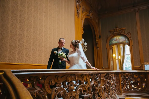 Wedding beautiful couple in the evening in a castle — Stock Photo, Image