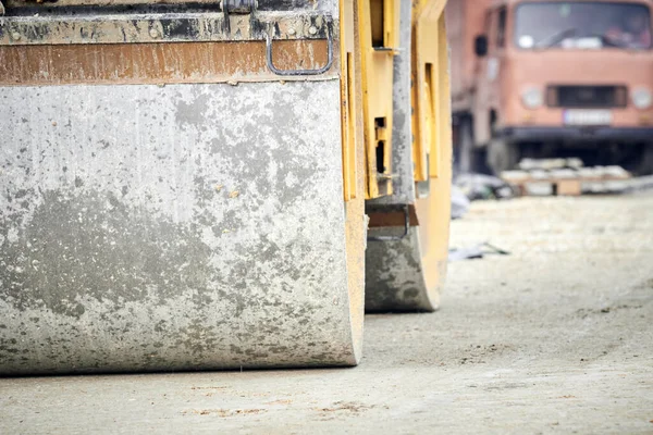 Heavy construction machines outdoors for public place reconstruction.