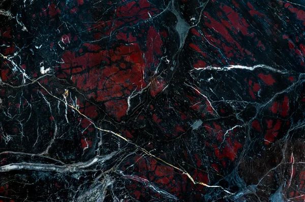 Ônix preto com manchas vermelhas textura — Fotografia de Stock
