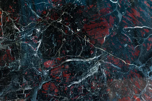 Zwarte onyx met rode vlekken textuur — Stockfoto