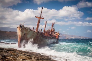 Abandoned shipwreck on Andros, Greece clipart