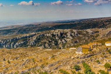 View of the coast of Gargano from mount of San Giovanni Rotondo in Puglia clipart