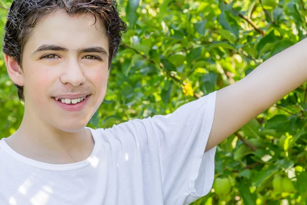 Teenager Next Rows Apple Trees Stretches Out His Hand Show — Stock Photo, Image