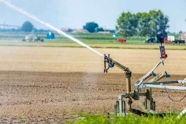 High Pressure Spray Irrigation Nozzle Watering Newly Sown Crops — Stock Photo, Image