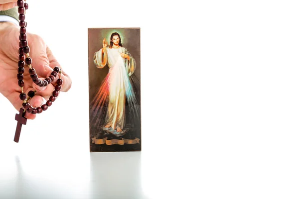 Jesus Misericordioso com fita em branco e contas de Rosário — Fotografia de Stock