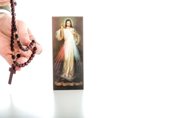 Jesus Misericordioso com fita em branco e contas de Rosário — Fotografia de Stock