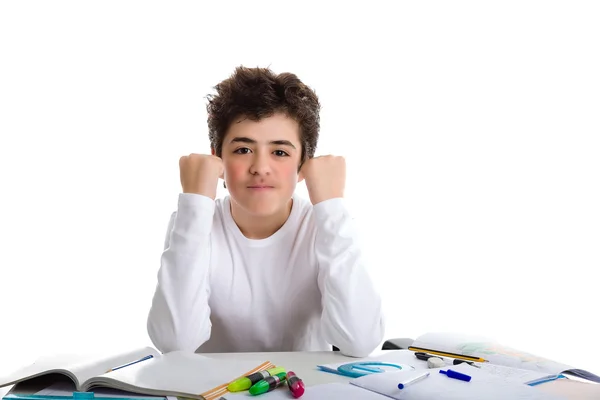 Young boy smiling on homework makes success gesture — Stock Photo, Image
