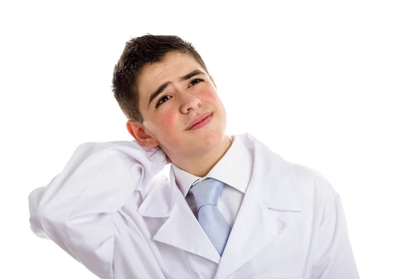 Fiú orvos nyújtás hátán — Stock Fotó