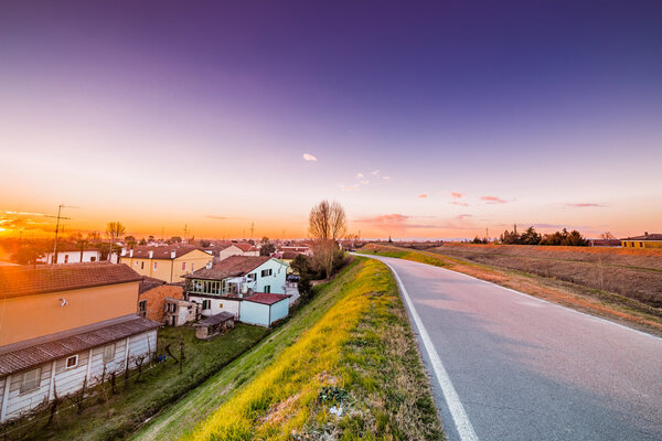 Road along the roofs of the houses of a small village in the countryside of Emilia Romagna in Italy