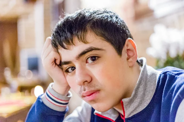 Teenager Pensive Brooding Restaurant Holding His Head One Hand — Stock Photo, Image