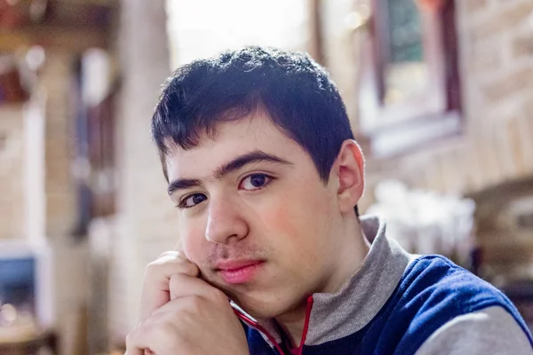 Teenager Pensive Brooding Restaurant Holding His Head One Hand — Stock Photo, Image