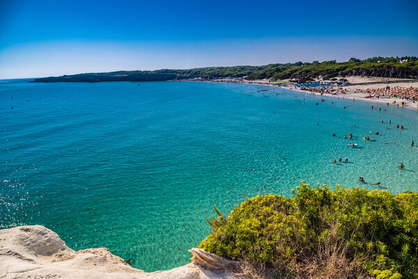 beach facilities on bay near rocky cove on the coast of Salento in Puglia in Italy