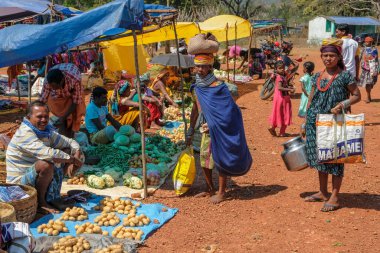 Onukudelli, India - February 2021: Adivasi women from the Bonda tribe at the Onukudelli market on February 25, 2021 in Odisha, India.