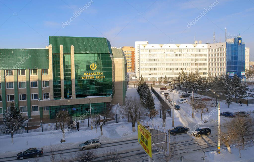 Kostanay - Kazakhstan - January 15, 2021: Halyk bank building exterior on blue sky background in winter time. National Savings Bank of Kazakhstan Joint-Stock Company.