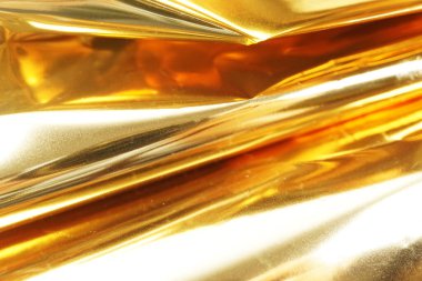 Altın metalik folyo arka plan. Metin için yer.