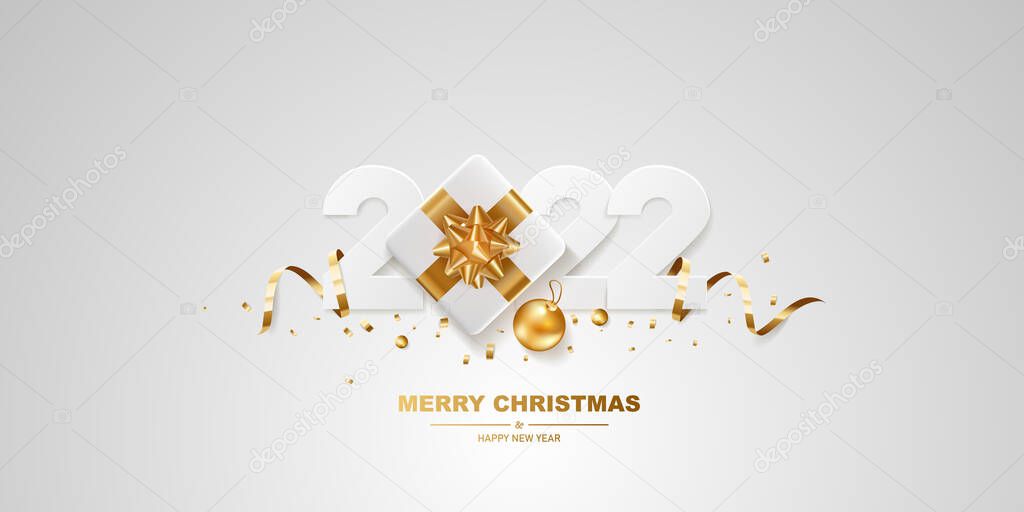 Happy New Year 2022. White paper numbers with golden ribbons, gift box and confetti on a white background.