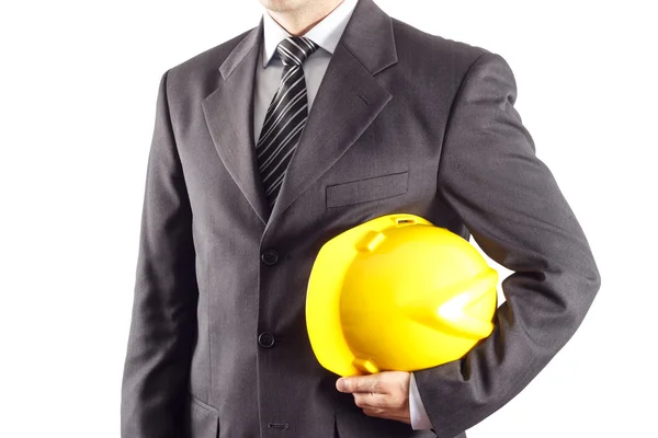 Бизнесмен или инженер, держащий шлем Лицензионные Стоковые Изображения