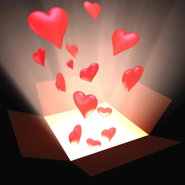 Open box with heart and light inside — Stock Photo, Image