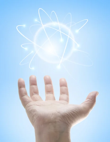 Hands controlling a ball of energy. — Stock Photo, Image