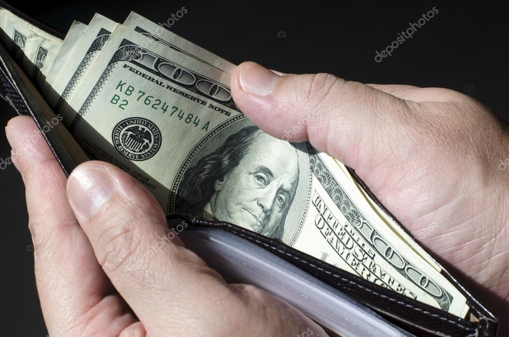 Cartera llena de dinero en dolares Foto de stock 63172895 ktsdesign