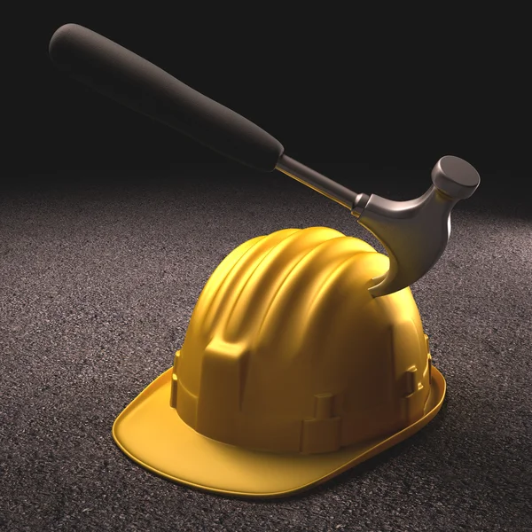 Hammer stuck in the helmet. — Stock Photo, Image