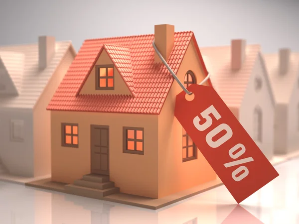 Yüzde 50'i yazılı kırmızı etiket ile küçük ev — Stok fotoğraf