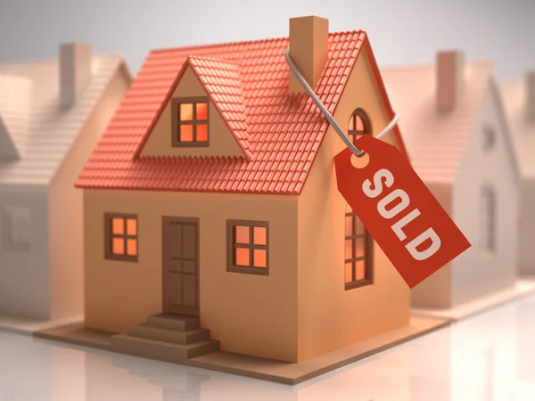 Small house with red label written sold. — Stock Photo, Image