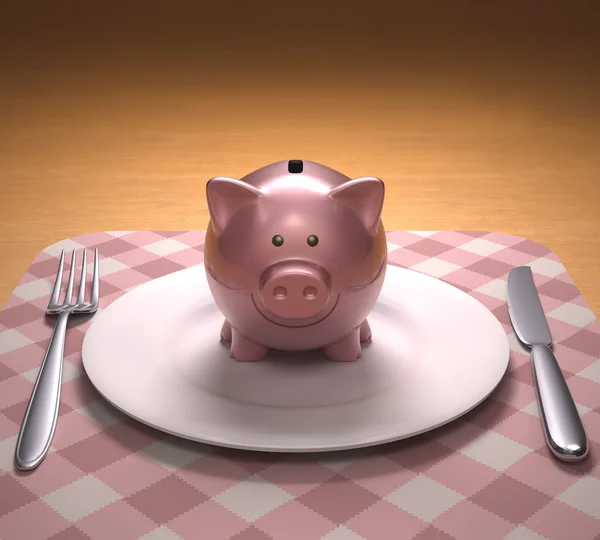Piggy bank on the plate — Stock Photo, Image