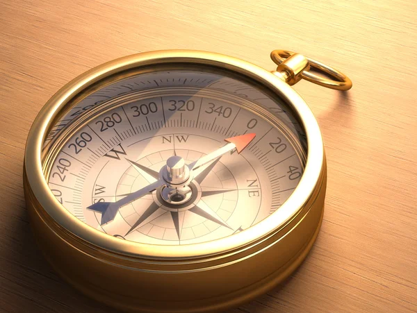 Compass on a wooden table — Stock Photo, Image