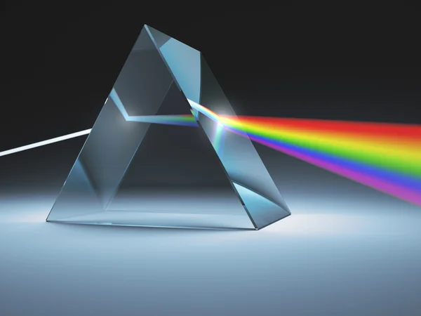 Crystal prism verspreidt vele kleuren. — Stockfoto