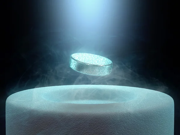 Levitación magnética por encima de un superconductor de alta temperatura —  Fotos de Stock