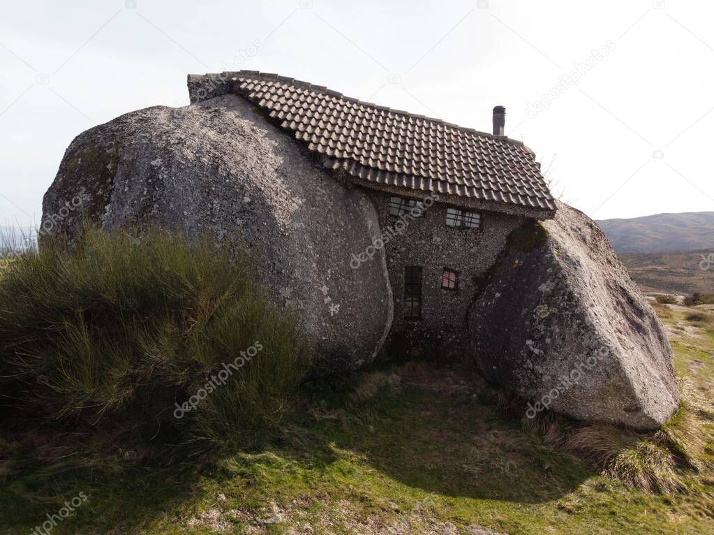 Casa do Penedo House between stone rocks architectural monument near Fafe, Northern Portugal