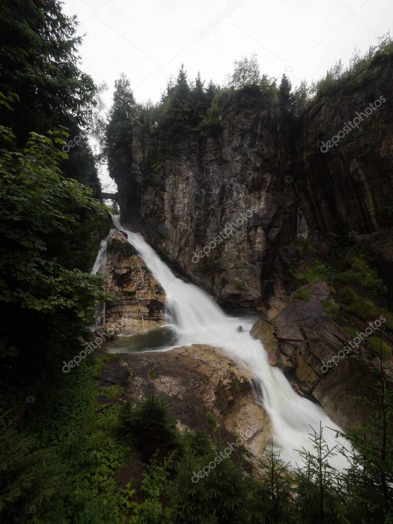 Panoramic view of Gasteiner Ache waterfall in tourist spa town Bad Gastein in St Johann im Pongau Salzburg Austria