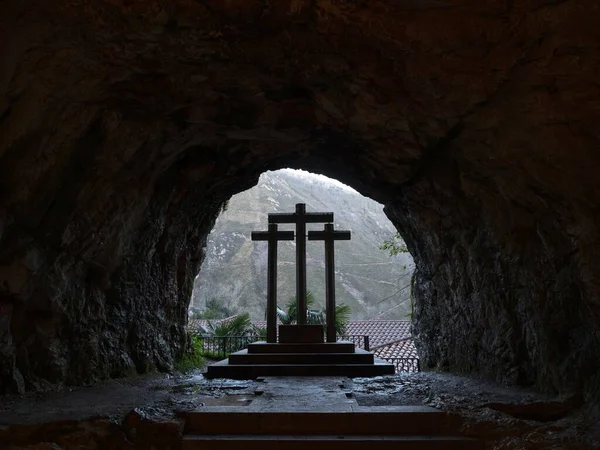 Three crosses religious christian symbol in catholic cave sanctuary Holy Cave of our lady Covadonga Asturias Spain — Stock Photo, Image