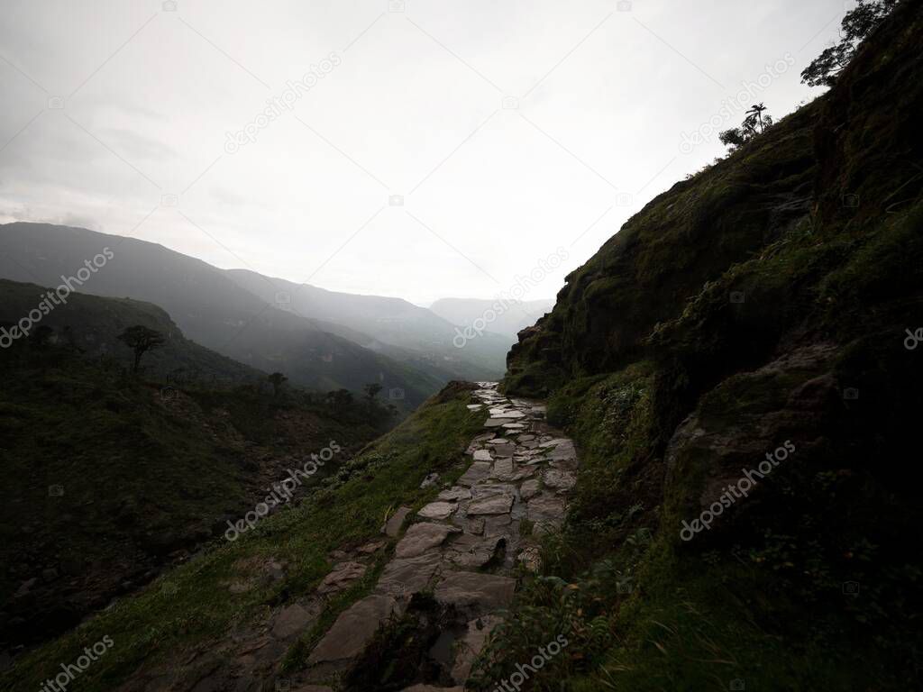 Stone hiking trail path leading to Catarata del Gocta waterfall cataract cascade in Bongara Amazonas near Chachapoyas in Peru andes South America