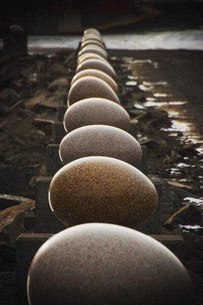 Eggin i Gledivik oversized granite stone eggs sculpture art installation in harbour of Djupivogur East Iceland Europe