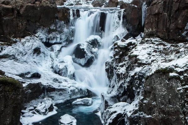 Winter panorama blue turquoise Fossarfoss Sveinsstekksfoss Nykurhylsfoss waterfall in Eyjolfsstadir Djupivogur Iceland — Stock Photo, Image