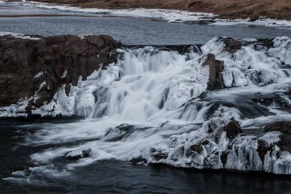 Lång exponering panorama över Glanni vattenfall kaskader på Nordura floden i Borgarfjodur Borgarbyggd Bifrost västra Island — Stockfoto