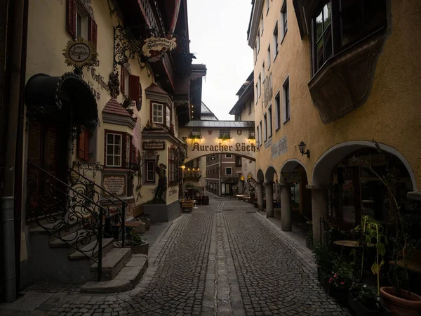 Panorama view of historic empty pedestrian street alley cobblestone narrow road Romerhofgasse in Kufstein Tyrol Austria — Stock Photo, Image